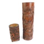 Two Chinese carved bamboo brush pots, comprising one with carved figures in windows, 37cm high, and