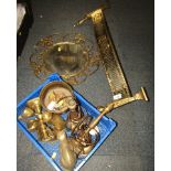 A brass fire surround, wall mirror, various brass animal ornaments, table lamps, etc. (1 box and a q
