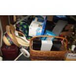 Household effects, comprising wicker baskets, hats, table lamp, vanity case, portable lamp, etc. (a