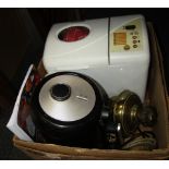 A bread maker, Tower air fryer, and brass oil lamp case.