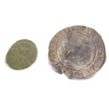 An Elizabeth I style sixpence type coin.