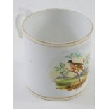 A 19thC porcelain cup, with gilt highlights and ear handle, hand painted with a bird in a naturalist