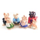 Various Wade pottery NatWest Pigs, to include Maxwell, 17cm high, two Baby Pigs, etc., and A Helpful