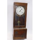 A 20thC Gledhill-Brook oak cased time recorder clock, the 25cm diameter Roman numeric dial, in oak c