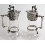 A matched pair of Edwardian silver, silver plated and cut glass claret jugs, by Elkington and Co, ea