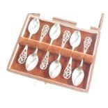 A set of George VI silver teaspoons, by DNH&S, with elaborate pierced handle and plain bowls, Sheffi