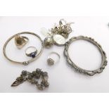 A group of silver costume jewellery, comprising ball pedant, bangles, neck chains, etc. (1 box)