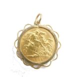 A Edward VII gold half sovereign in 9ct gold mount, 3cm high, 5.2g all in.