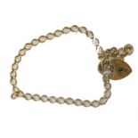 A 9ct gold bracelet, with a heart shaped clasp marked .375, 15cm long, 7g.