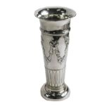 An Edward VII silver vase, by Goldsmith and Silversmith Company, of trumpet shaped form, repousse de