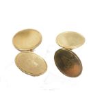 A pair of 9ct gold Masonic cufflinks, each with chain link centres and plain oval ends, 1.5cm high,