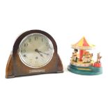 A Corgi Toys Magic Roundabout musical automaton, and an oak cased chiming eight day mantel clock, wi