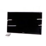 A Samsung Dolby SRS 46" flat screen television, in black trim.