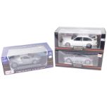 Three various boxed diecast cars, to include Minichamps Car Collection Audi TT 2006, 21cm wide, etc.