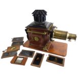 A late Victorian brass, mahogany and toleware magic lantern, stamped D. Noakes and Sons, Greenwich,