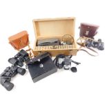 Various binoculars, cameras, a Stanmod Depose set, a Kodak camera, pair of Carl Zeiss Jena DDR 8x30