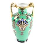 A 20thC Noritake vase, in green with gilt floral and blue glazes, 17cm high.