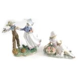 A Lladro figure group, figure of a girl aside scarecrow with pumpkins, 5385, 27cm high, and another