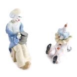 A Lladro figure of Pierrot, 05812 printed marks beneath, and a Nao figure of a clown. (with two boxe