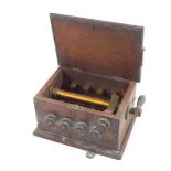 A 20th century boxed scientific instrument, possibly railway related, with articulated brass section