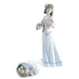 A Lladro figure, Innocence in Bloom, 07644, 22cm high and a further figure duck and ducklings. (2, e