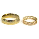 Two dress rings, comprising a weaved design band, yellow metal, unmarked, and a Lord of the Rings me