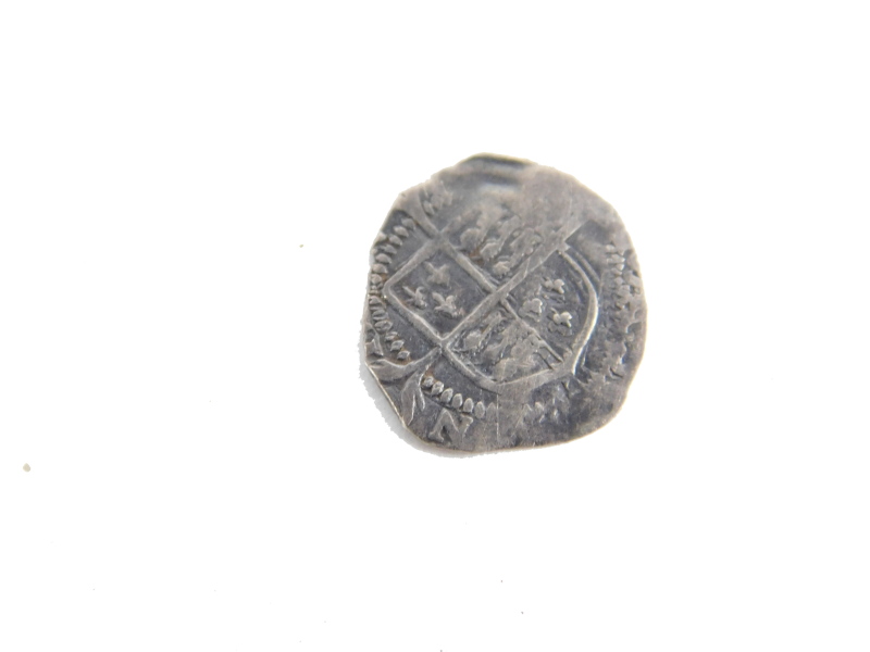 An Elizabeth I style penny type coin.