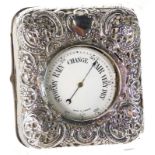 A silver plated pocket barometer, with white enamelled dial, stamped Made in London contained in a l