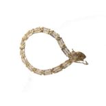 A 9ct gold bracelet, with heart shaped clasp, 18cm long, 3.4g.