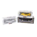 Three various boxed diecast cars, to include UT Models Cabriolet 1:18 scale Mercedes, in yellow, 21c