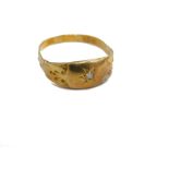 A gypsy ring, with textured setting, set with small white stone, marked 18C, size J, 1.2g all in.