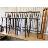 A set of four beech stained highchairs and a clothes rails.