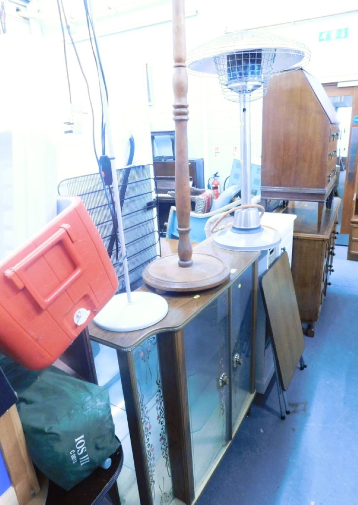 Display cabinet, lamp stand, patio heater and electric light with two cone shades. WARNING! This lot