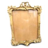 A plaster gilt frame, of small proportion, set with scrolls and acanthus leaves, 33cm x 26cm.