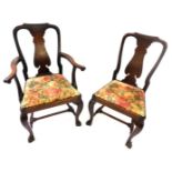 A set of eight early 20thC mahogany dining chairs in Queen Anne style, each with a solid splat,