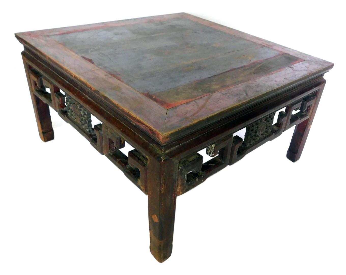 A Chinese hardwood coffee table, the square cleated top above a pierced carved frieze, on shaped leg