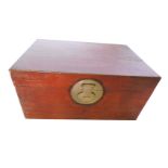 A Chinese camphor wood chest, with circular brass lock plate and brass drop handles, 46cm high, 94cm