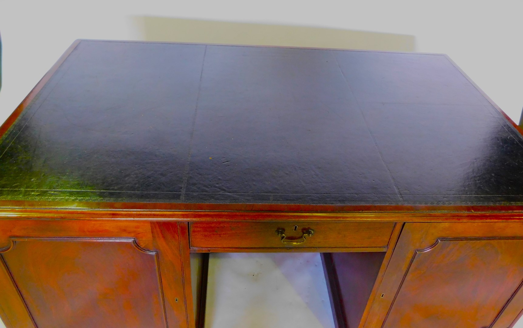 A 19thC mahogany partner's kneehole desk, the rectangular top with a black tooled leather inset and - Image 3 of 3