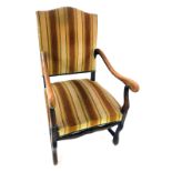 A late 19th/early 20thC Continental beech open armchair, upholstered in striped fabric, on shaped le