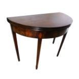 A George III mahogany demi lune tea table, with hinged top, on square tapering legs, headed by oval