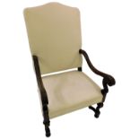 A Continental walnut open armchair, with a cream upholstered padded back and seat, the channelled ar