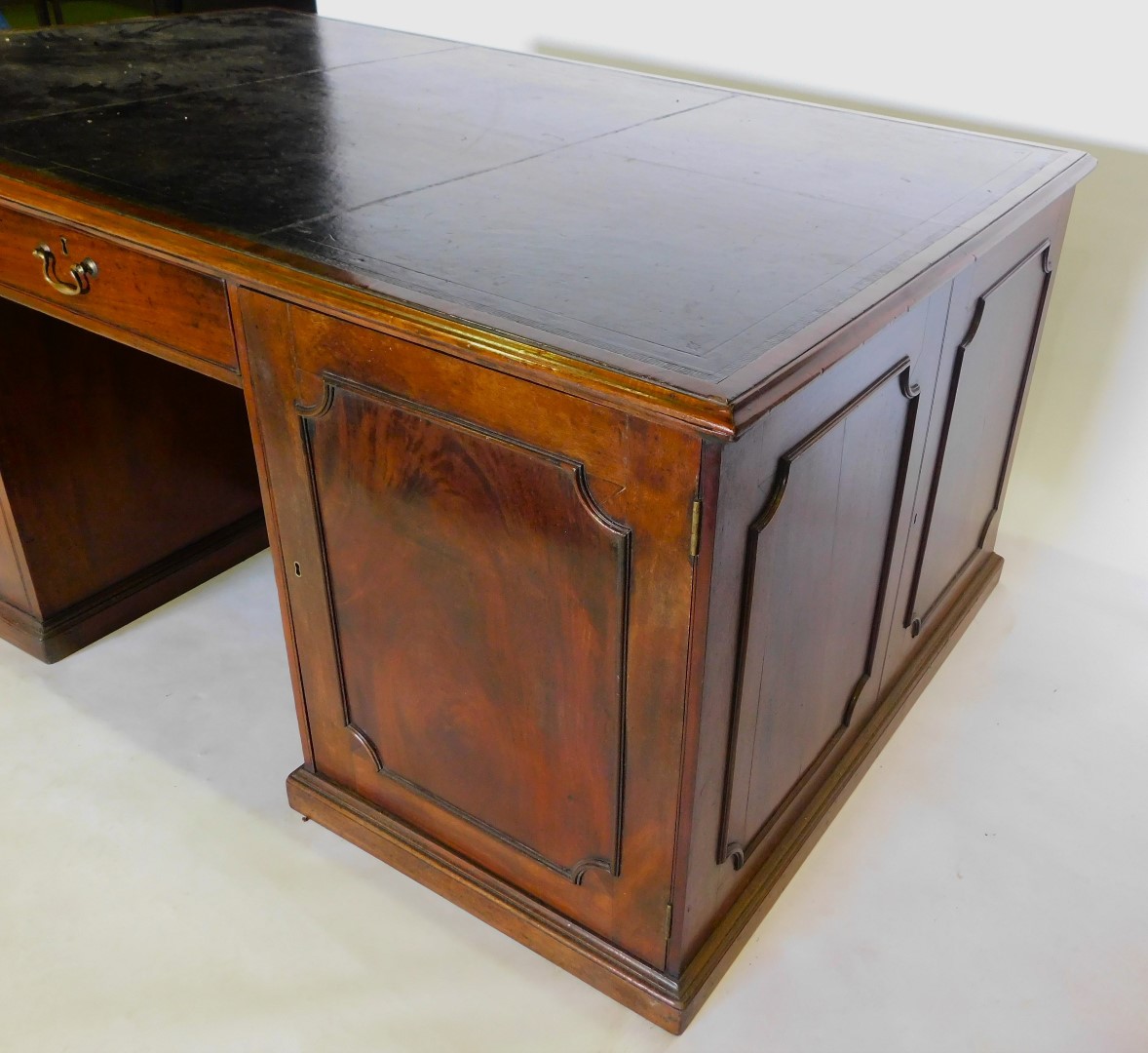 A 19thC mahogany partner's kneehole desk, the rectangular top with a black tooled leather inset and - Image 2 of 3