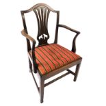 A 19thC mahogany shield back side chair, with a padded seat, on square tapering legs, a George III s