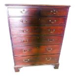 A George III mahogany tall chest of drawers, the rectangular top with a moulded edge, above two shor