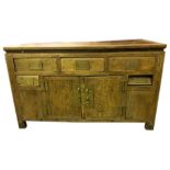 A 19thC Chinese elm side cabinet, with drawers and cupboards, 90cm high, 150cm wide, 66cm deep.