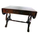 A 19thC mahogany sofa table, the rectangular top with a cross banded border and rounded ends, above