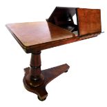 An early Victorian plum pudding mahogany metamorphic reading and music table, the rectangular top wi