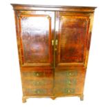 A walnut wardrobe, in mid 18thC style, with a moulded cornice above two doors with two part panelled