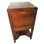 A 19thC Anglo Chinese campaign gentleman's wash stand, the hinged top revealing a vacant interior an