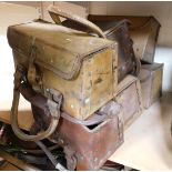 A selection of military leather toolboxes.